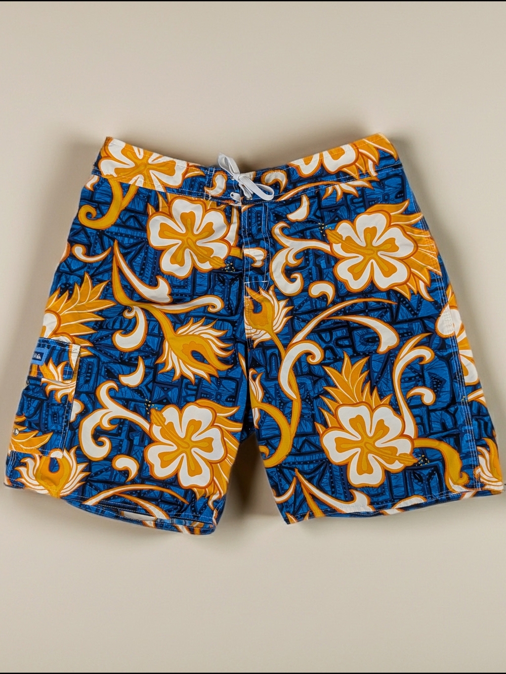 Quiksilver Blue and Yellow Floral Board Shorts‎